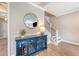 Charming entryway features stylish decor, wood flooring, and staircase access at 3173 Hugh Bennett Dr, Johns Island, SC 29455