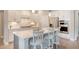 Bright kitchen featuring quartz countertops, stainless appliances, and an island with seating at 3173 Hugh Bennett Dr, Johns Island, SC 29455