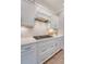 Gourmet kitchen equipped with stainless steel appliances, white cabinetry, and ample counter space at 3173 Hugh Bennett Dr, Johns Island, SC 29455