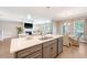 Modern kitchen features a large island, stainless appliances, and an open layout for entertaining at 3173 Hugh Bennett Dr, Johns Island, SC 29455