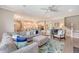 Comfortable living room featuring a large sectional sofa and open floor plan to kitchen at 3173 Hugh Bennett Dr, Johns Island, SC 29455