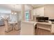 This cozy office nook has built-in cabinets and plenty of workspace to stay productive at 3173 Hugh Bennett Dr, Johns Island, SC 29455