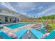 Gorgeous pool with lounge chairs and lush landscaping provides a perfect outdoor oasis for relaxation and entertainment at 3173 Hugh Bennett Dr, Johns Island, SC 29455