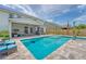 Beautiful pool and deck surrounded by lush greenery, creating a serene and private outdoor space for relaxation at 3173 Hugh Bennett Dr, Johns Island, SC 29455