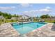 Beautiful pool with comfortable lounge chairs and lush landscaping, creating a relaxing outdoor experience at 3173 Hugh Bennett Dr, Johns Island, SC 29455