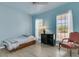 Comfortable bedroom features natural light from two windows, plus a ceiling fan at 318 Oyster Bay Dr, Summerville, SC 29486