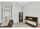 Bright home office with a desk, bookcase, laminate flooring, and view to the bedroom at 318 Oyster Bay Dr, Summerville, SC 29486