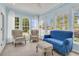 Cozy sunroom with bright natural light, comfortable seating, and neutral color palette to relax in at 318 Oyster Bay Dr, Summerville, SC 29486