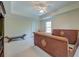 Bright bedroom with a trey ceiling, ceiling fan, a window, and a distinctive woven bed frame at 321 Bounty Ln, Charleston, SC 29412