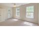 Light-filled bedroom with two large windows and a door leading to the balcony at 321 Bounty Ln, Charleston, SC 29412