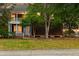 Two-story home boasts a covered front porch and well-manicured lawn at 321 Bounty Ln, Charleston, SC 29412