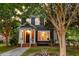 Charming two-story home with a well-maintained front yard and inviting front porch at 321 Bounty Ln, Charleston, SC 29412