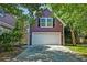 A spacious detached garage is connected to the main house by a walkway at 321 Bounty Ln, Charleston, SC 29412