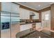 Features stainless steel appliances, granite counters, and classic white cabinetry at 321 Bounty Ln, Charleston, SC 29412