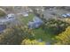 An aerial view of the property, highlighting the home, lush greenery and neighborhood surroundings at 33 Elliott Ct, Walterboro, SC 29488