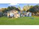 Expansive backyard featuring lush green lawn, wood fence, with a generous open space ideal for outdoor enjoyment at 33 Elliott Ct, Walterboro, SC 29488