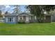Charming single-story home with blue and brick exterior and well maintained lawn at 33 Elliott Ct, Walterboro, SC 29488