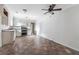 Open concept kitchen features classic cabinets and ample space for dining at 33 Elliott Ct, Walterboro, SC 29488