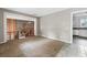 Cozy living room featuring a unique brick fireplace and an open floor plan at 33 Elliott Ct, Walterboro, SC 29488