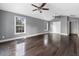 Bright living room with sleek hardwood floors, high ceilings, and modern windows at 33 Elliott Ct, Walterboro, SC 29488