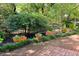 Beautiful backyard patio with various potted plants and privacy fence, creating a serene outdoor oasis at 344 Lantana Dr, Charleston, SC 29407
