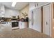 Bright kitchen equipped with white cabinetry, stainless steel appliances, and a practical layout at 344 Lantana Dr, Charleston, SC 29407
