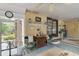 Screened porch featuring an outdoor living space with decorations and access to a garden at 344 Lantana Dr, Charleston, SC 29407