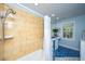 Well-lit bathroom featuring shower-tub combo and elegant vanity with sink at 3738 Station Point Ct, Mount Pleasant, SC 29466