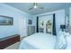 Comfortable bedroom with access to the porch, soft blue accents, and natural light at 3738 Station Point Ct, Mount Pleasant, SC 29466