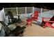 Outdoor space with white railings featuring red and gray Adirondack chairs and a small round table at 3738 Station Point Ct, Mount Pleasant, SC 29466