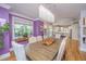 Spacious dining room featuring an open layout and hardwood floors, seamlessly connecting to the kitchen at 3738 Station Point Ct, Mount Pleasant, SC 29466