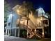 Charming two-story home with a beautifully lit staircase and dual balconies at 3738 Station Point Ct, Mount Pleasant, SC 29466