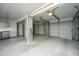 Spacious garage with epoxy flooring and overhead door at 3738 Station Point Ct, Mount Pleasant, SC 29466
