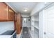 Hallway with tile floor, cabinets, and shelves at 3738 Station Point Ct, Mount Pleasant, SC 29466