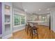 Stylish kitchen with breakfast bar, white cabinetry, and a view to the kitchen at 3738 Station Point Ct, Mount Pleasant, SC 29466