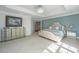 Spacious main bedroom with tray ceiling, accent wall, and large window, a peaceful sanctuary at 3738 Station Point Ct, Mount Pleasant, SC 29466