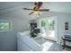 Bright office space featuring a ceiling fan and glass doors to a balcony with natural lighting at 3738 Station Point Ct, Mount Pleasant, SC 29466