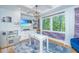Cozy playroom with large windows, built in storage and coffered ceilings at 3738 Station Point Ct, Mount Pleasant, SC 29466