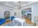 Bright dining area/playroom area with coffered ceilings and views to the living room at 3738 Station Point Ct, Mount Pleasant, SC 29466