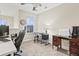Functional home office with a window view, comfortable desk chair, and bright lighting at 3901 Poplar Grove Pl, Summerville, SC 29483