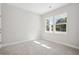 Bright, airy bedroom with two windows providing natural light and view of the outdoors at 399 Claret Cup Way, Charleston, SC 29414