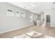 Spacious upstairs living area with natural light and access to a modern bathroom at 399 Claret Cup Way, Charleston, SC 29414
