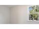 Bright room with a large window and a peaceful view of the trees and sky at 399 Claret Cup Way, Charleston, SC 29414