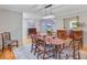 Inviting dining room boasts hardwood floors, and adjacent sitting area at 4292 Cloudmont Dr, Hollywood, SC 29449