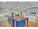 Kitchen featuring a large center island with hardwood countertop, stainless steel appliances and wood flooring at 4292 Cloudmont Dr, Hollywood, SC 29449