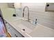 Kitchen sink with stainless steel faucet and quartz countertops, plus white subway tile backsplash at 4292 Cloudmont Dr, Hollywood, SC 29449