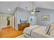 Main bedroom with hardwood floors and ensuite bathroom featuring a soaking tub at 4292 Cloudmont Dr, Hollywood, SC 29449