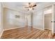 Empty bedroom features wood flooring, neutral walls, and ceiling fan at 4546 Holly St, North Charleston, SC 29405