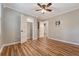 Spacious bedroom features wood floors and a ceiling fan at 4546 Holly St, North Charleston, SC 29405