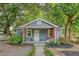 Charming single story home featuring a cozy front porch and a well maintained yard, offering an inviting curb appeal at 4546 Holly St, North Charleston, SC 29405